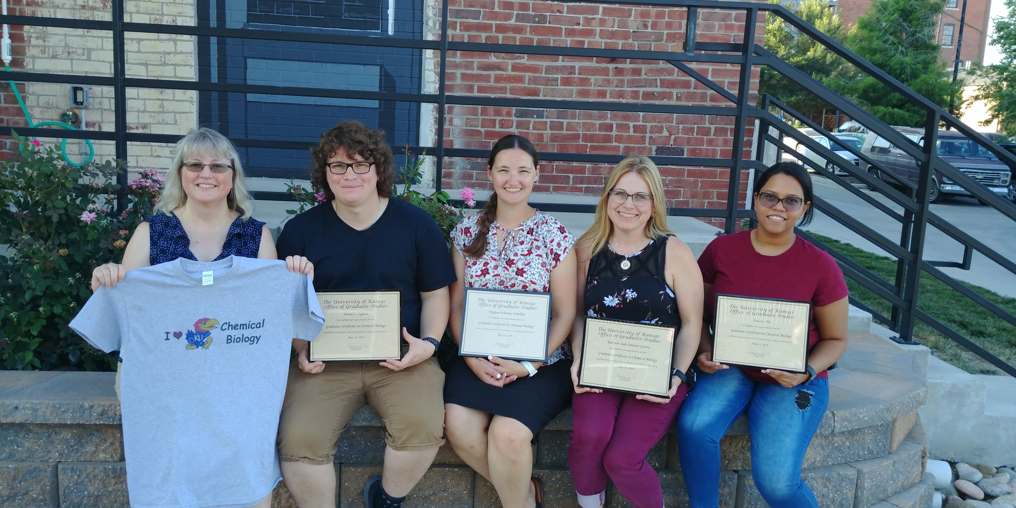 Prof. Audrey Lamb with four studens